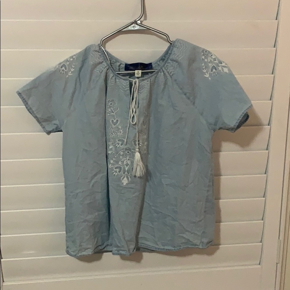 light blue top with white embroidery